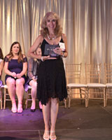 woman accepting and award