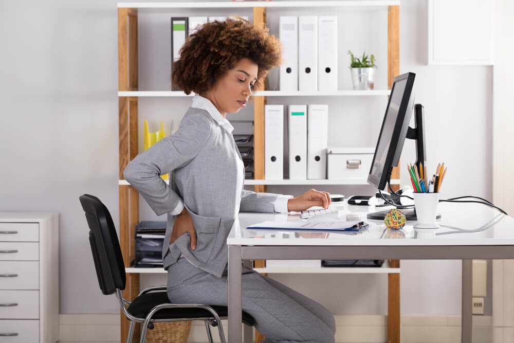 business woman back pain