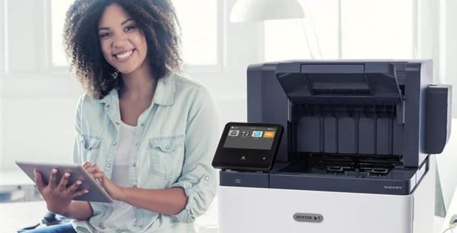 Woman using Xerox Remote Print Services for her Xerox VersaLink Printer
