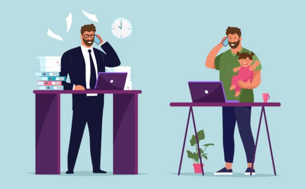 Workplace businessman in the office. A man with a phone and a child in his arms at a remote work from home. The concept of career growth, work and family, freelance and work in a company