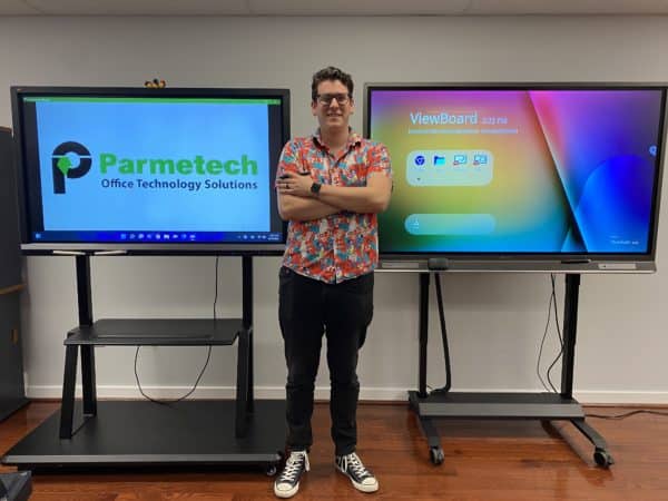 Matt, ViewSonic Demo specialist for Parmetech, standing with two ViewSonic ViewBoard Demo Units